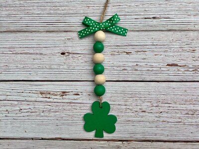 Shamrock canister bead garland, green clover, March tiered tray accent. Gift for Irish family, hutch decor, green mini wood bead garland - image1
